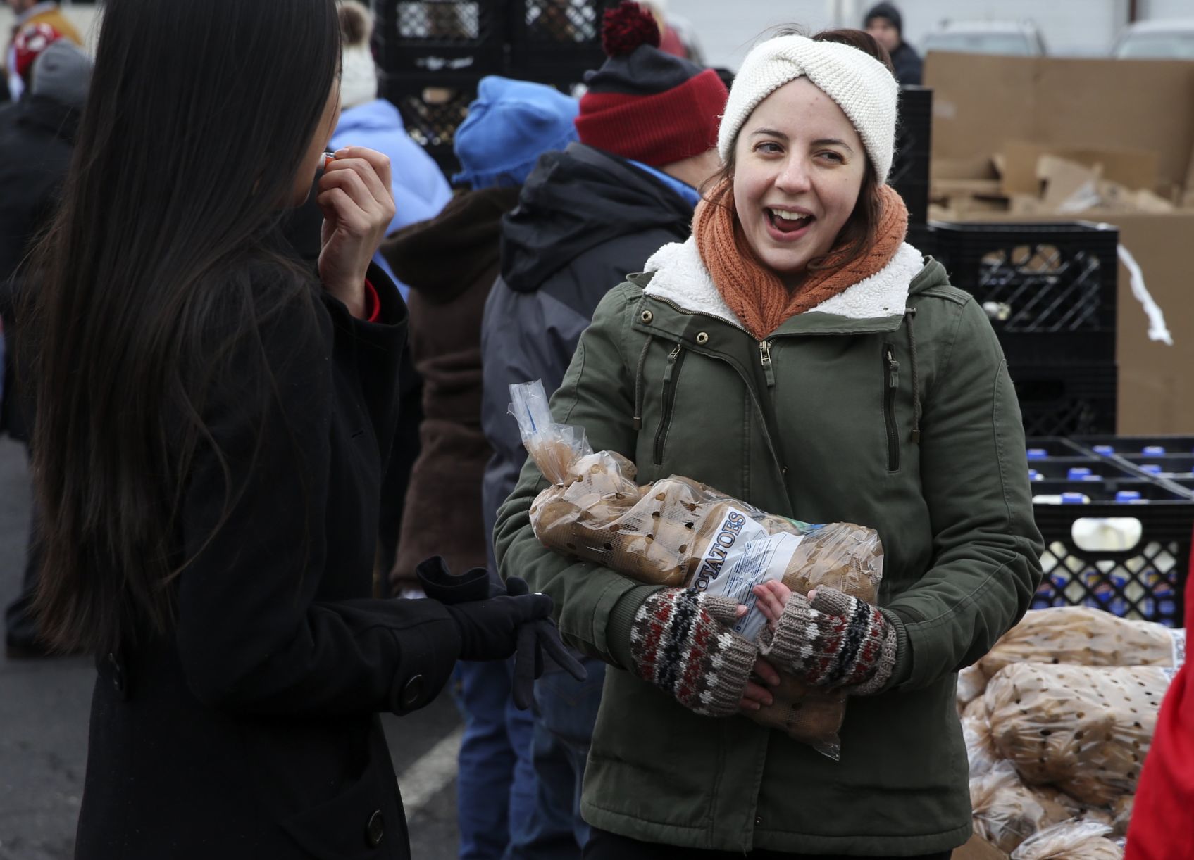 Volunteers hand out food for 'Thanksgiving Together' event